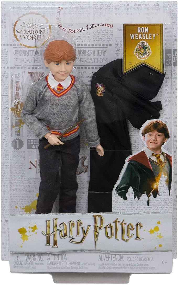 Mattel Harry Potter - Ron Weasley, personaggio da collezionare alto 27 cm, con uniforme di Hogwarts, morbido mantello e bacchetta di Grifondoro inclusi, giocattolo per bambini, 6+ anni